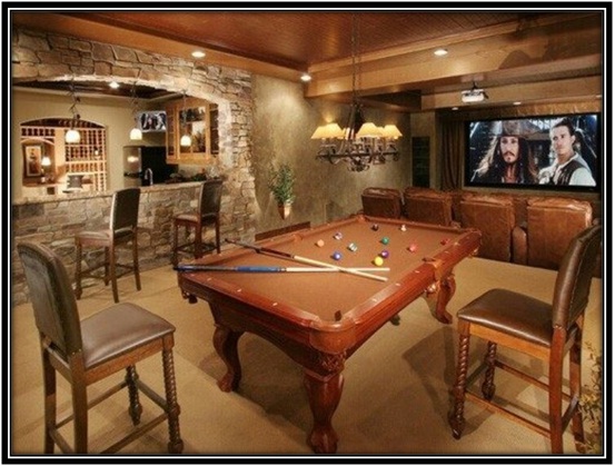 basement includes a large flat screen TV, a bar, and a wine cellar